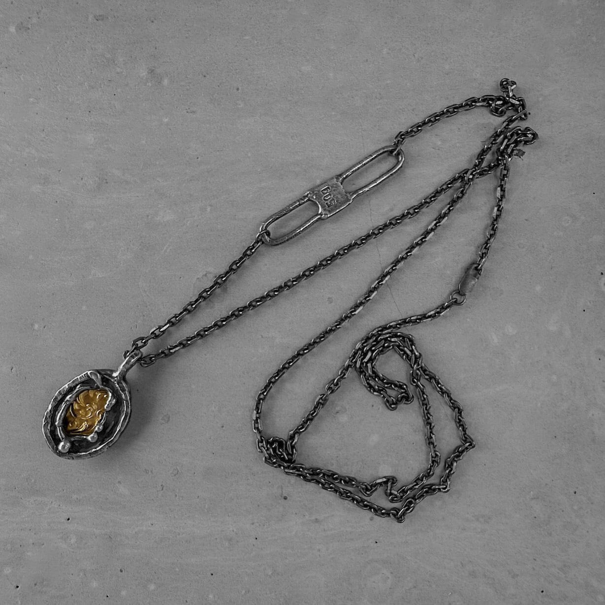 Heritage pendant - unusual pendant with chain made of sterling silver with a texture of melted metal, gilded patterns and antique motifs. Charms & Pendants project50g 