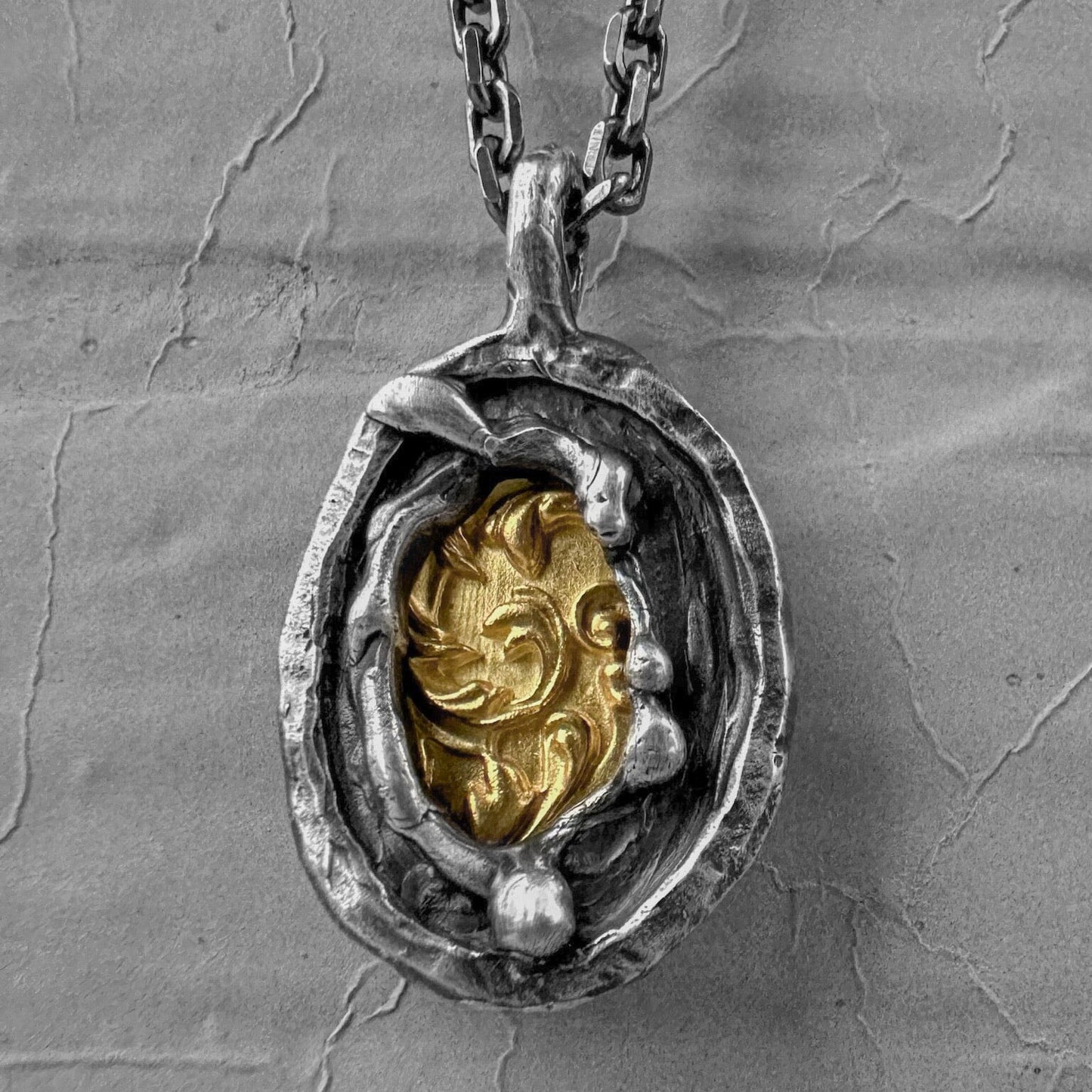 Heritage pendant - unusual pendant with chain made of sterling silver with a texture of melted metal, gilded patterns and antique motifs. Charms & Pendants project50g 