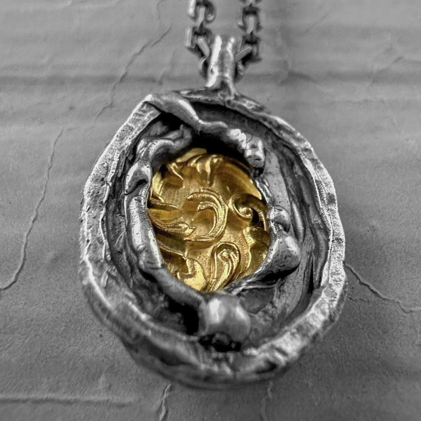 Heritage pendant - unusual pendant with chain made of sterling silver with a texture of melted metal, gilded patterns and antique motifs. Charms & Pendants project50g 