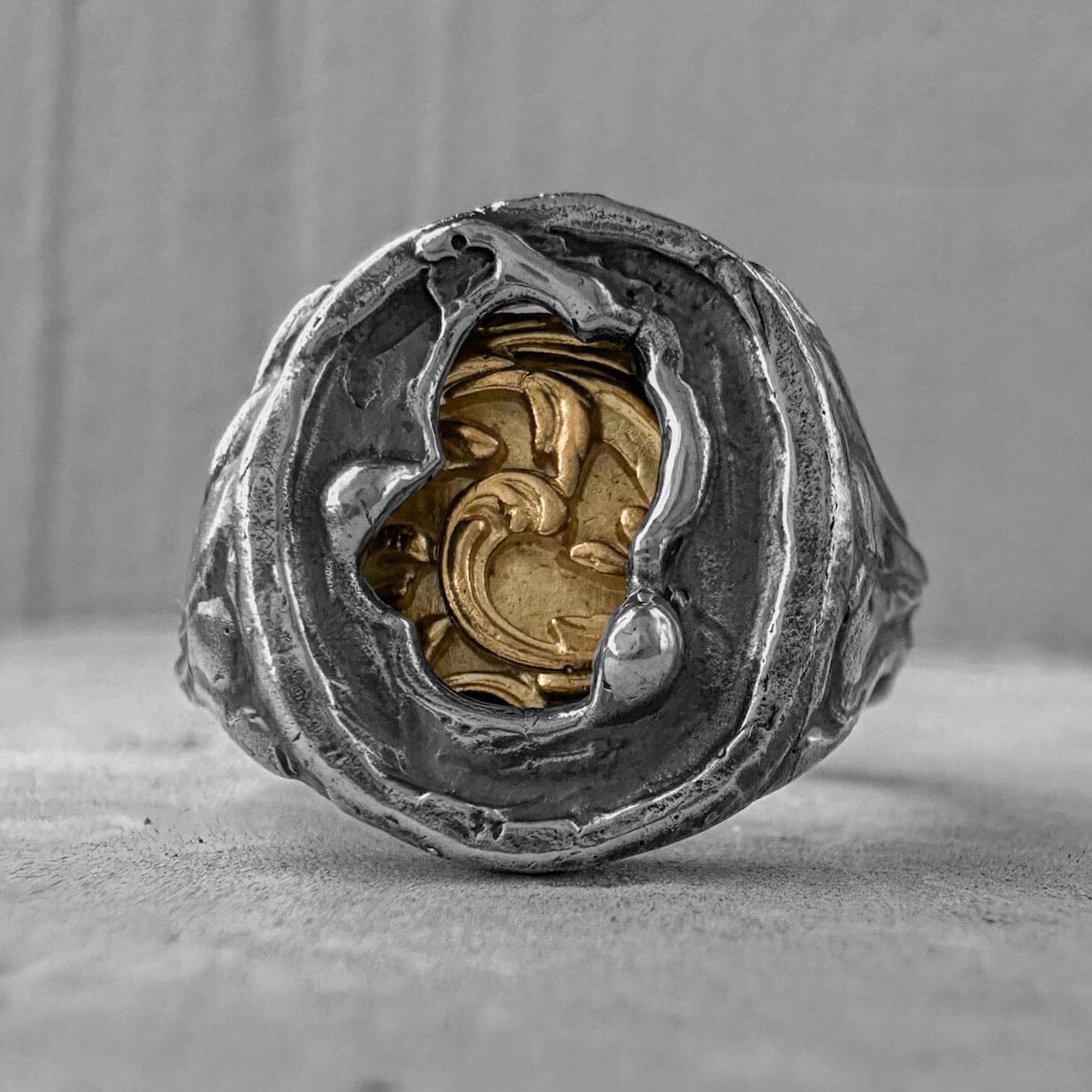 Heritage Ring - unusual signet ring made of sterling silver with a texture of melted metal, gilded patterns and antique motifs. Unusual rings project50g 