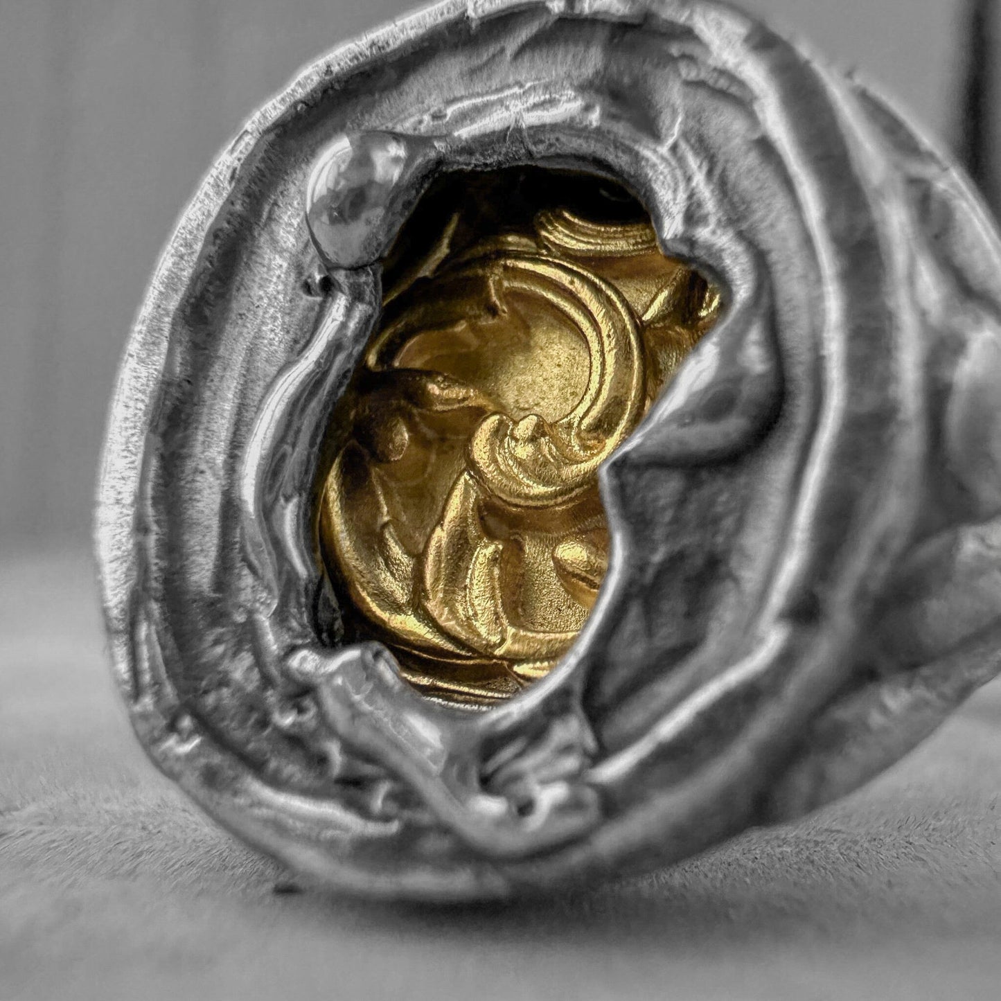 Heritage Ring - unusual signet ring made of sterling silver with a texture of melted metal, gilded patterns and antique motifs. Unusual rings project50g 