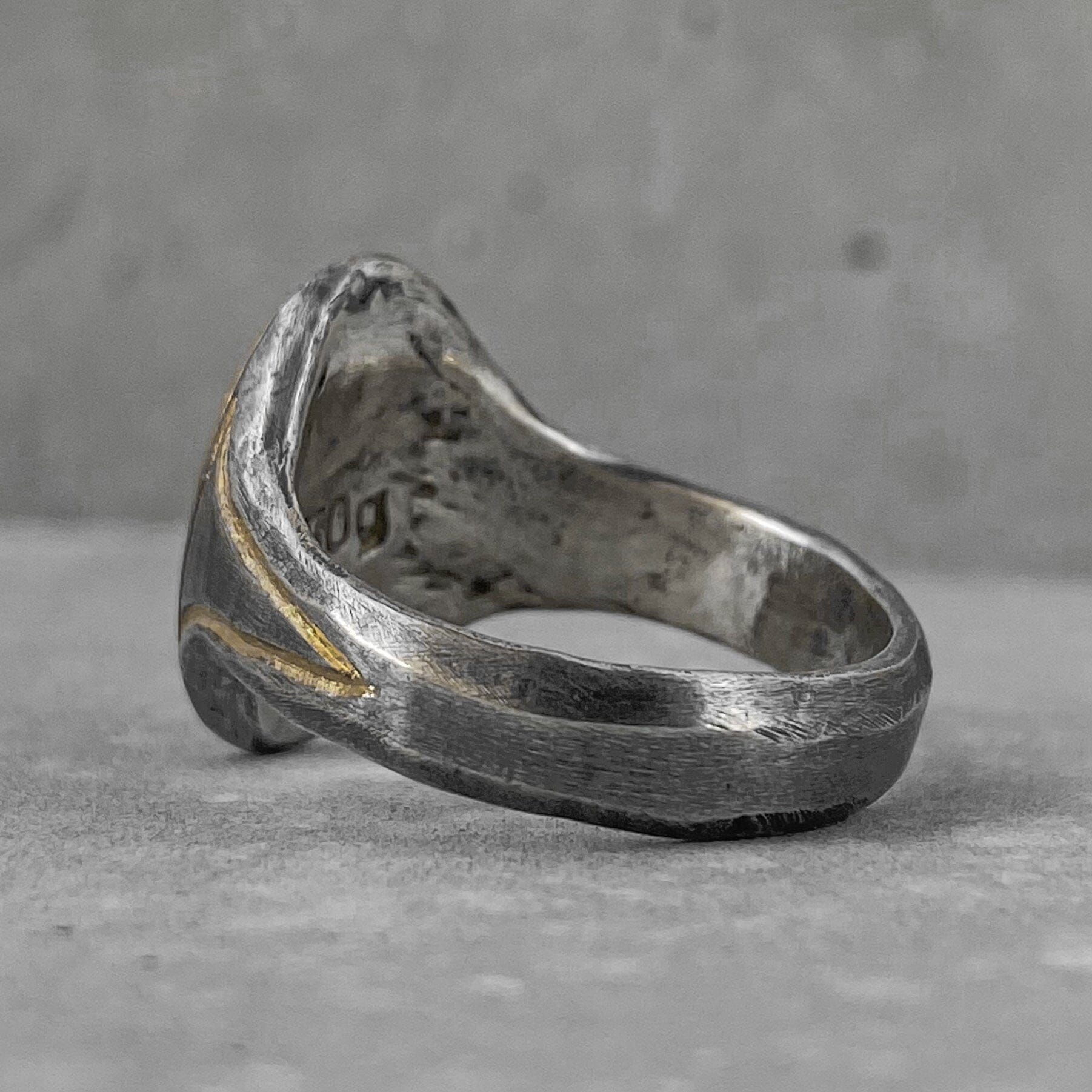 Oval ring- Elegant oval ring with gold plated elements and scratched texture Rings with smooth texture Project50g 
