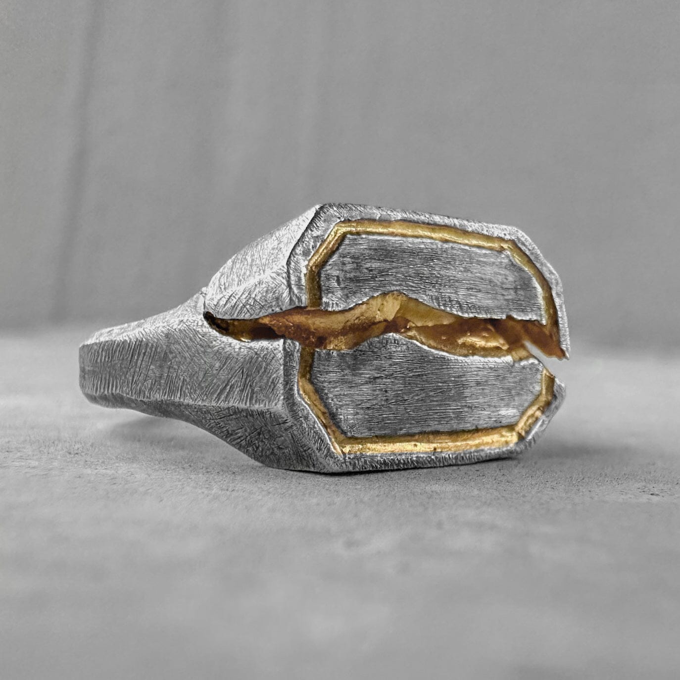 Phantom ring-rectangular sterling silver ring with deep crack, scratch texture and gilded frame Rings with cracks and patterns Project50g 