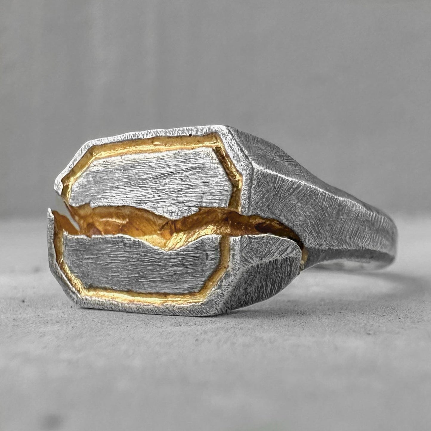 Phantom ring-rectangular sterling silver ring with deep crack, scratch texture and gilded frame Rings with cracks and patterns Project50g 