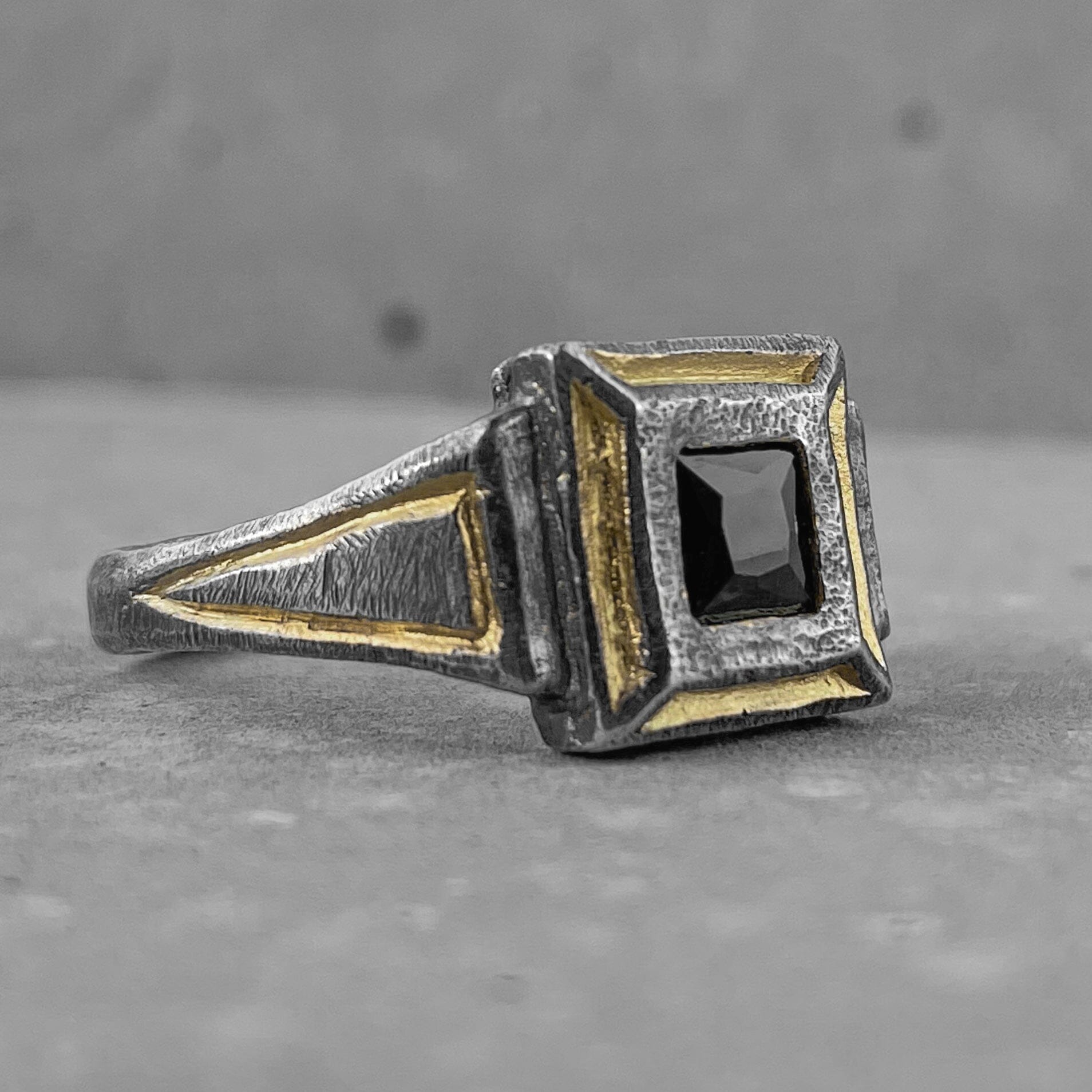 The Renaissance ring- a square signet ring with a large black stone and gold plated elements in the composition. Black diamonds rings Project50g 