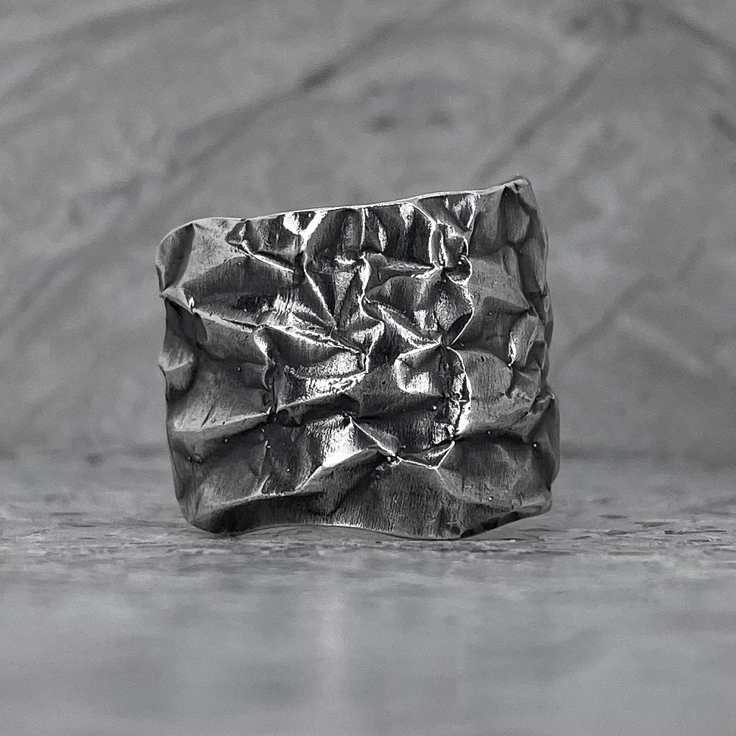 Crumpled ring-A very wide open ring with a texture reminiscent of crumpled foil with large kinks Open rings Project50g 