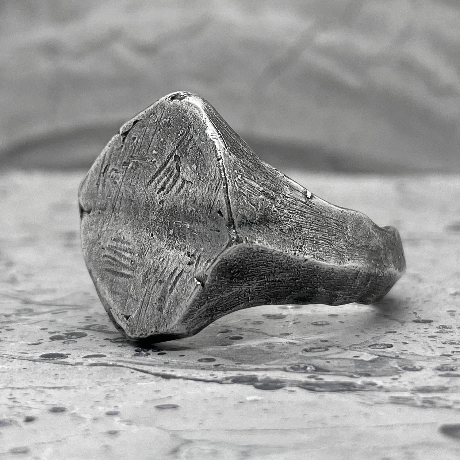 Project50g | Millennium ring- asymmetrical signet ring with soft scratched  silver texture
