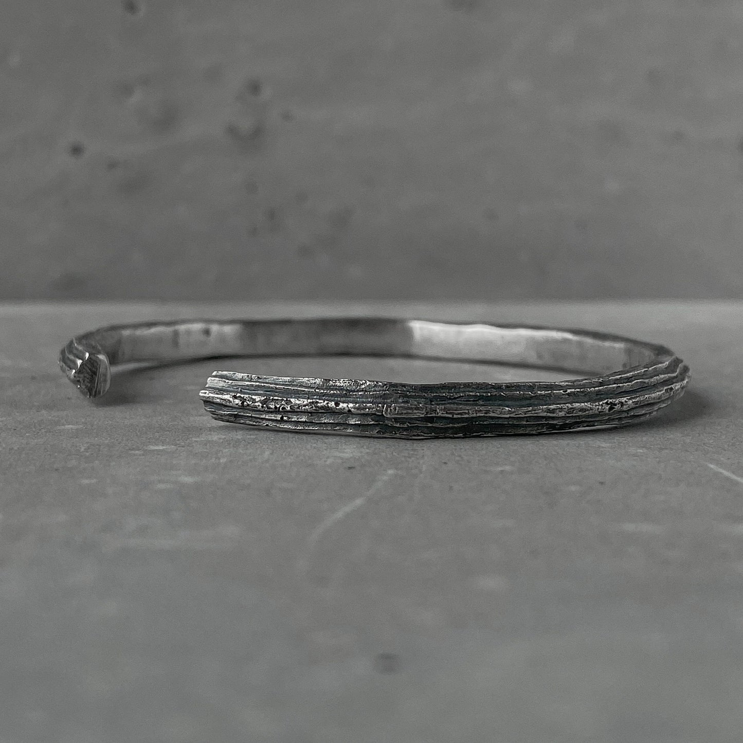 Orbit bangle- thin silver cuff bracelet with unusual hancrafted texture Bracelets Project50g 