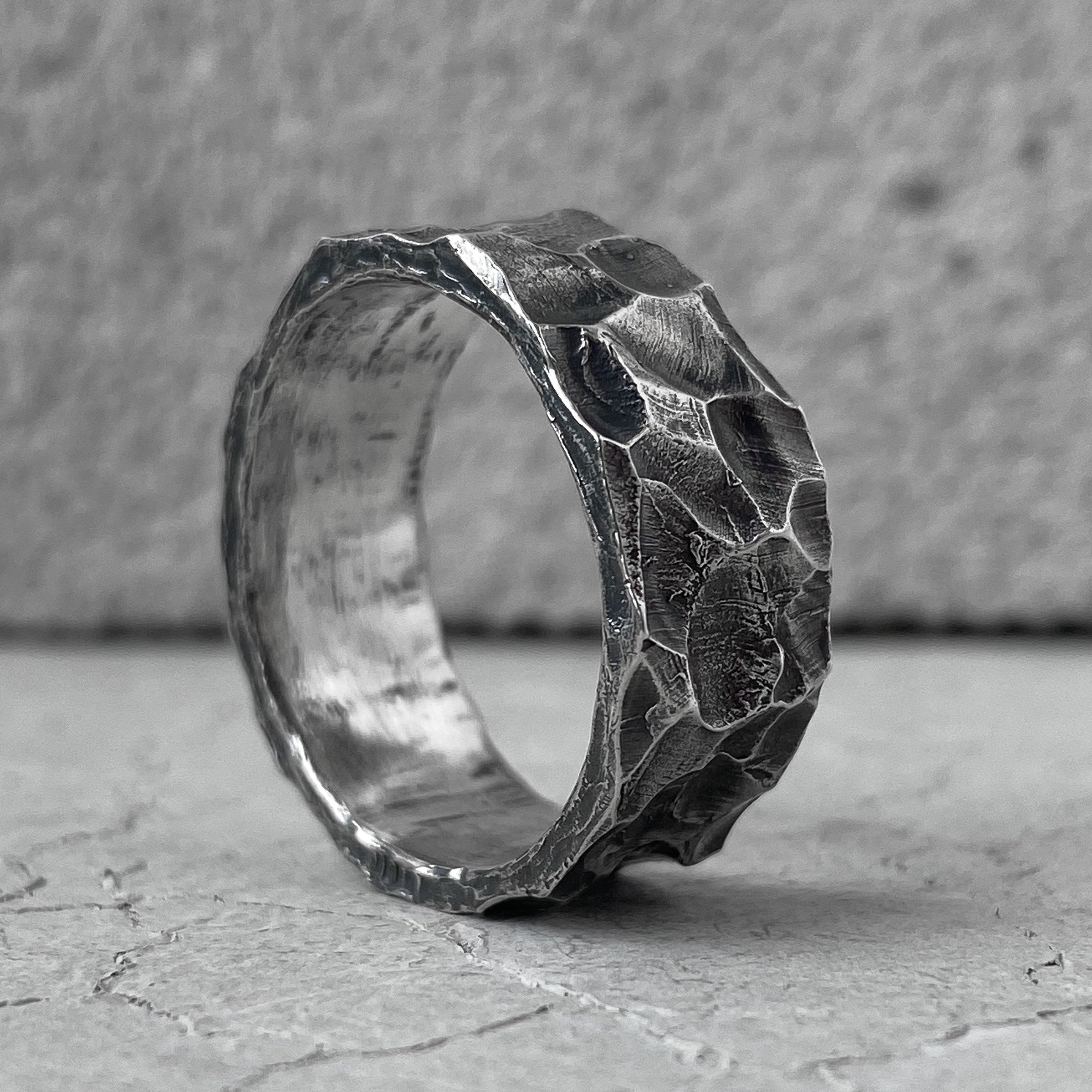 WAVE ring- wide band ring annular strip with a texture resembling surging  waves on the surface